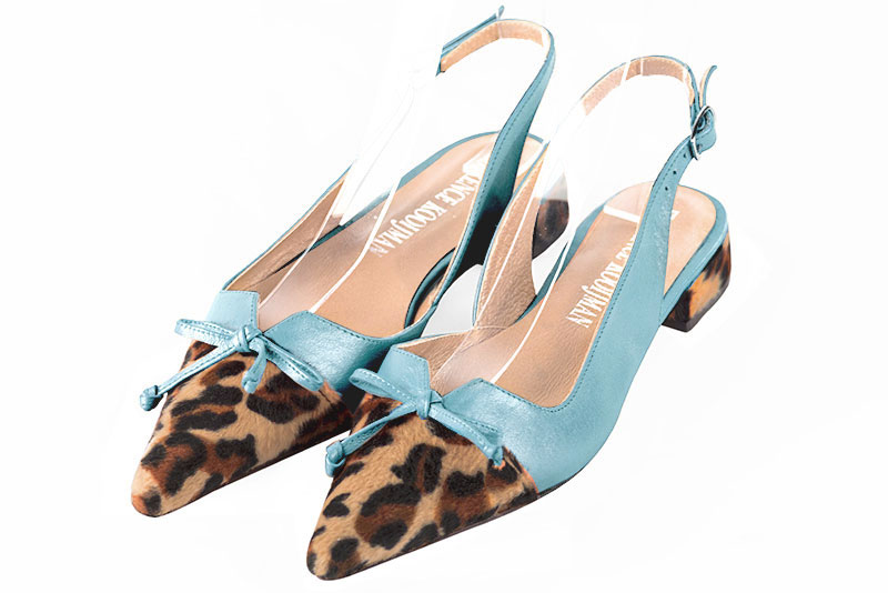 Safari black and sky blue women's open back shoes, with a knot. Pointed toe. Flat flare heels. Front view - Florence KOOIJMAN